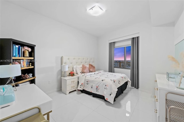 bedroom with light tile flooring