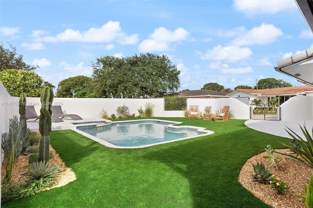 view of swimming pool featuring an in ground hot tub, a yard, and a patio