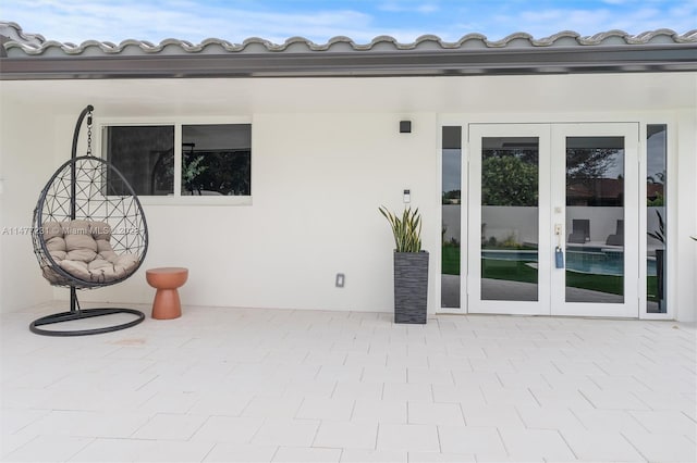 view of patio / terrace featuring french doors