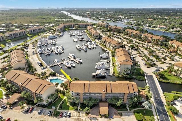 drone / aerial view featuring a water view