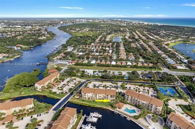 bird's eye view with a water view