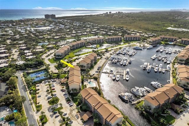 drone / aerial view with a water view