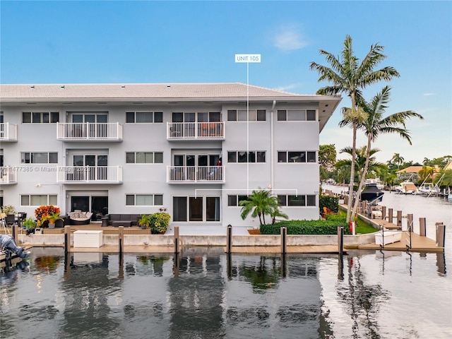 view of building exterior featuring a water view