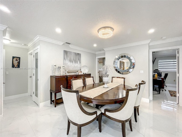 dining area with light tile floors, a textured ceiling, french doors, and ornamental molding