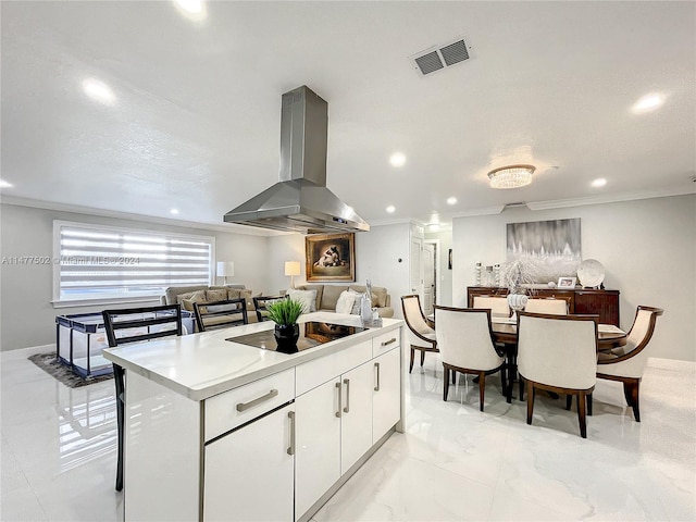 kitchen featuring white cabinetry, black electric cooktop, light tile floors, island exhaust hood, and ornamental molding