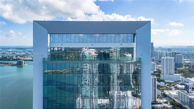 view of building exterior featuring a water view