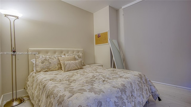 bedroom with light hardwood / wood-style flooring