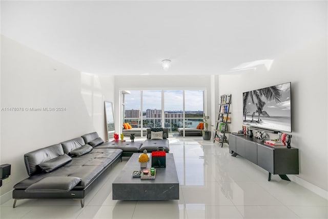 living room featuring light tile flooring