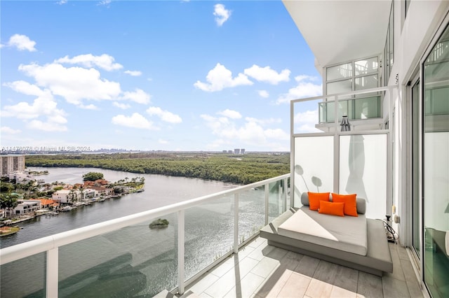 balcony featuring a water view