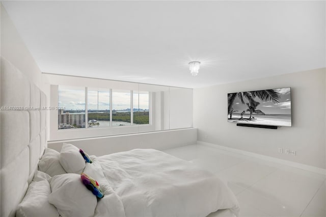 bedroom featuring light tile floors