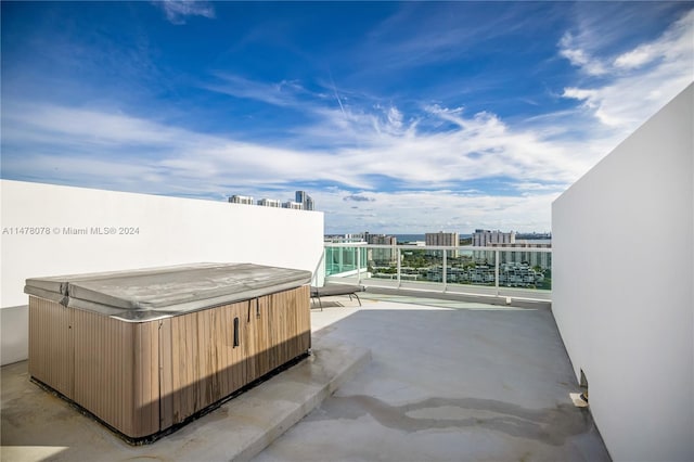 view of patio with a hot tub