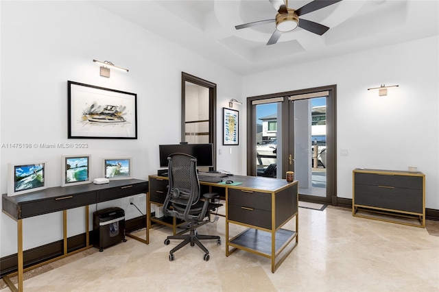 office space with a ceiling fan, coffered ceiling, and baseboards