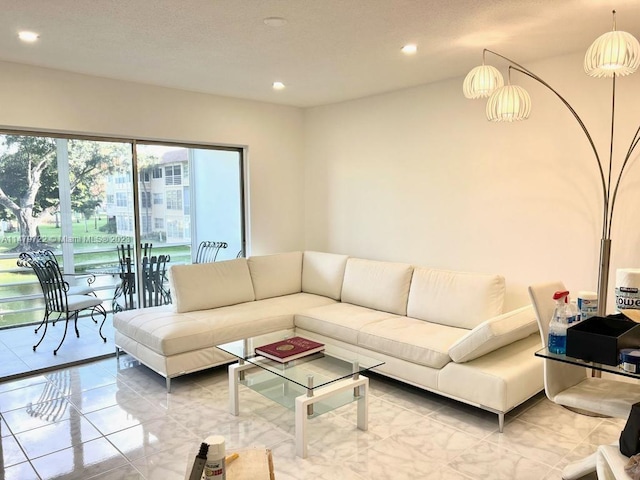 tiled living room featuring a wealth of natural light