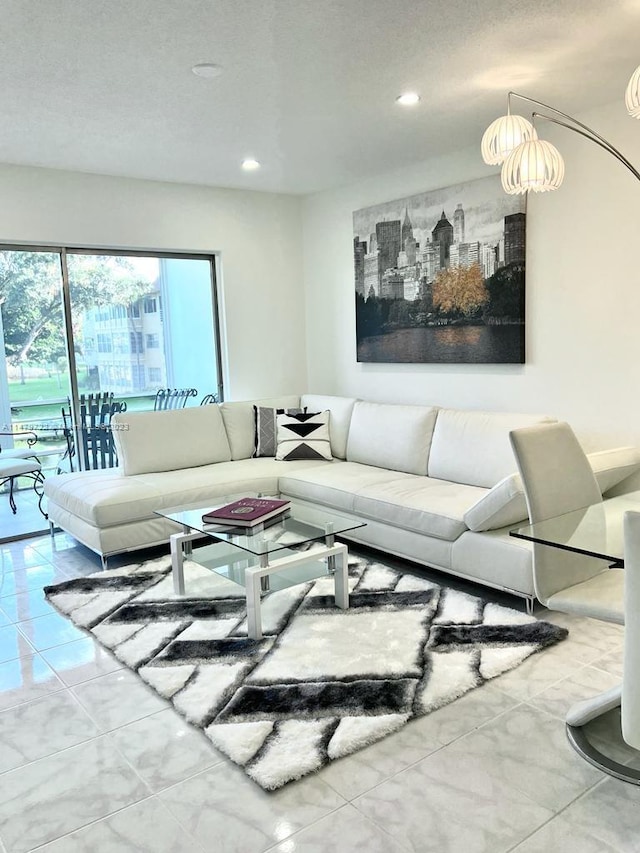 living room featuring an inviting chandelier