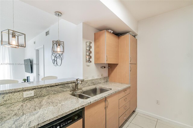 2775 NE 187th St Unit 516, Aventura, FL 33180 - kitchen featuring light tile patterned flooring, visible vents, a sink, and light brown cabinets