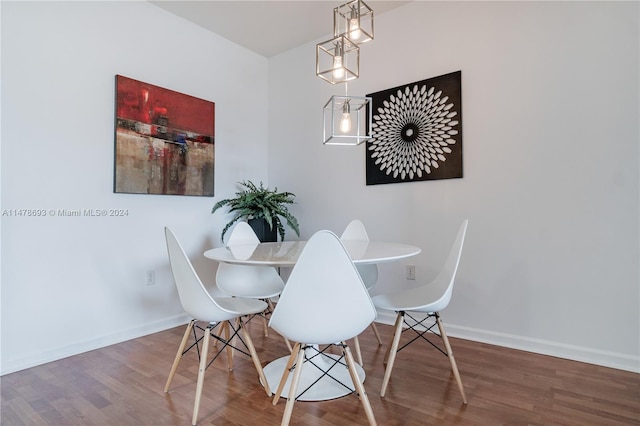 2775 NE 187th St Unit 516, Aventura, FL 33180 - dining room featuring baseboards and wood finished floors