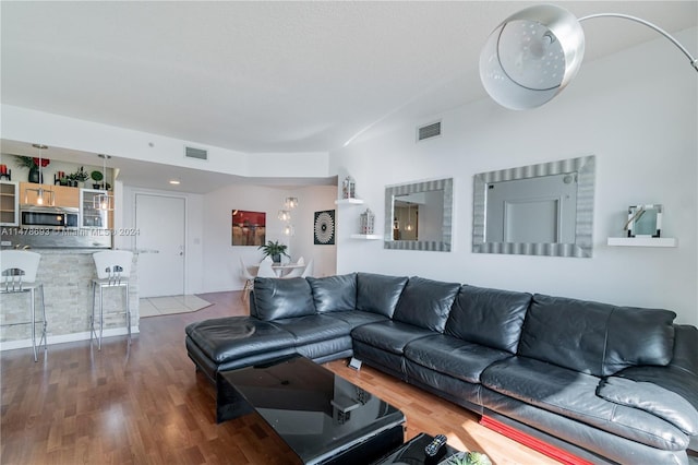 2775 NE 187th St Unit 516, Aventura, FL 33180 - living room featuring visible vents and wood finished floors