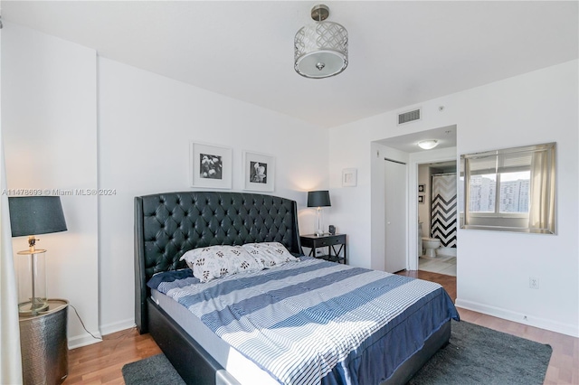2775 NE 187th St Unit 516, Aventura, FL 33180 - bedroom with visible vents, wood finished floors, and baseboards