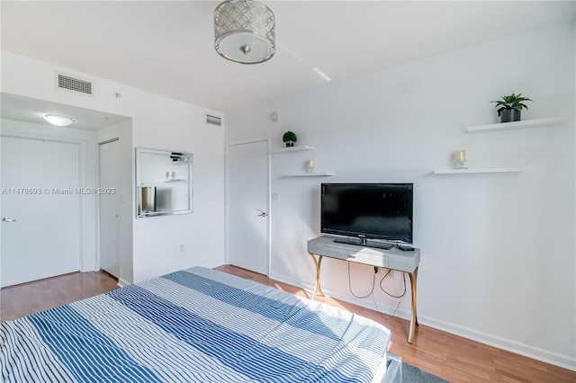 2775 NE 187th St Unit 516, Aventura, FL 33180 - bedroom with visible vents and wood finished floors
