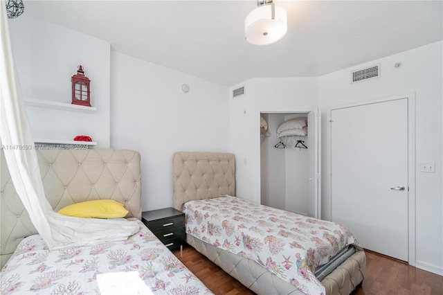 2775 NE 187th St Unit 516, Aventura, FL 33180 - bedroom with visible vents and wood finished floors