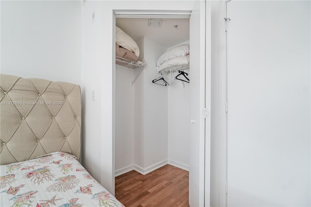 2775 NE 187th St Unit 516, Aventura, FL 33180 - bedroom featuring visible vents and wood finished floors