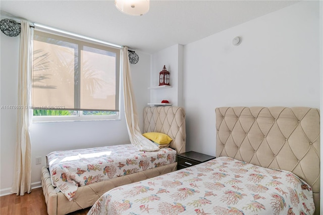 2775 NE 187th St Unit 516, Aventura, FL 33180 - bedroom featuring wood finished floors