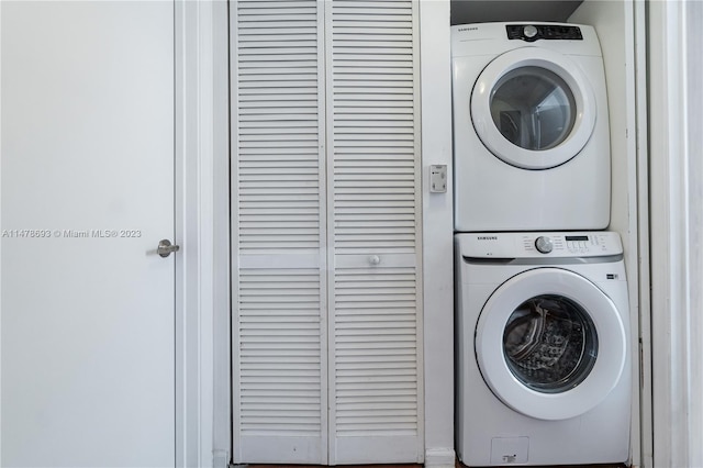 2775 NE 187th St Unit 516, Aventura, FL 33180 - washroom featuring stacked washer and dryer and laundry area