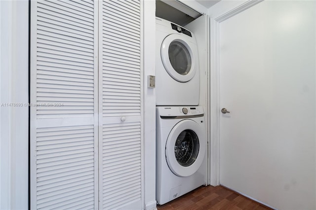 2775 NE 187th St Unit 516, Aventura, FL 33180 - clothes washing area featuring stacked washer / dryer, laundry area, and dark wood finished floors