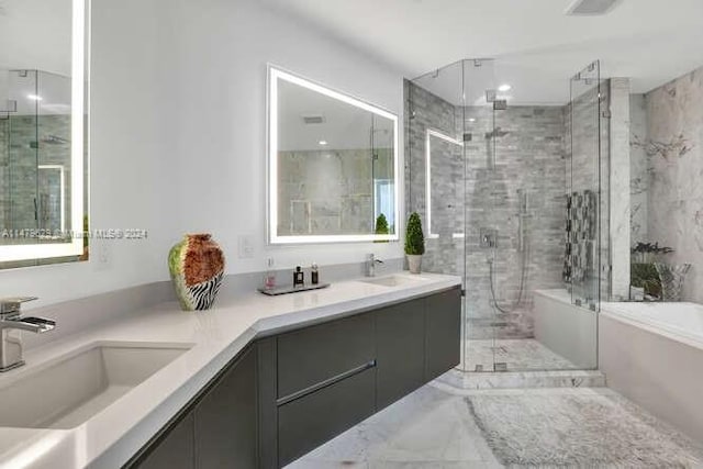 bathroom with oversized vanity, double sink, plus walk in shower, and tile flooring