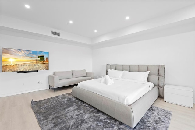 bedroom with light wood-type flooring