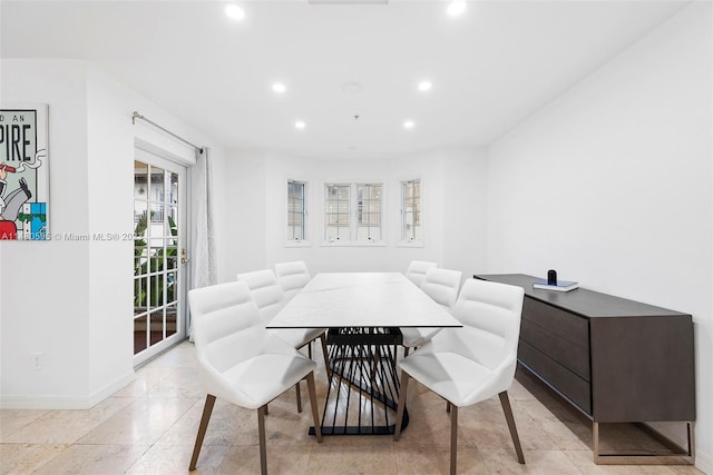 dining room with light tile flooring