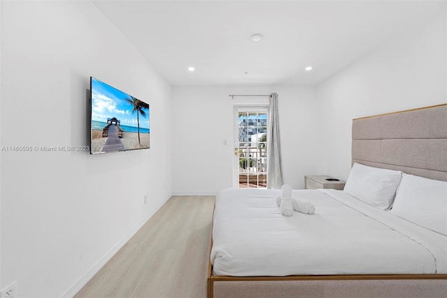 bedroom with light hardwood / wood-style floors