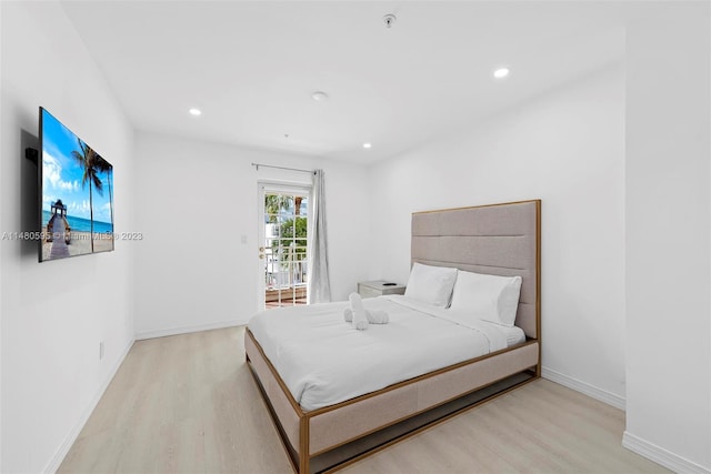 bedroom with light hardwood / wood-style floors