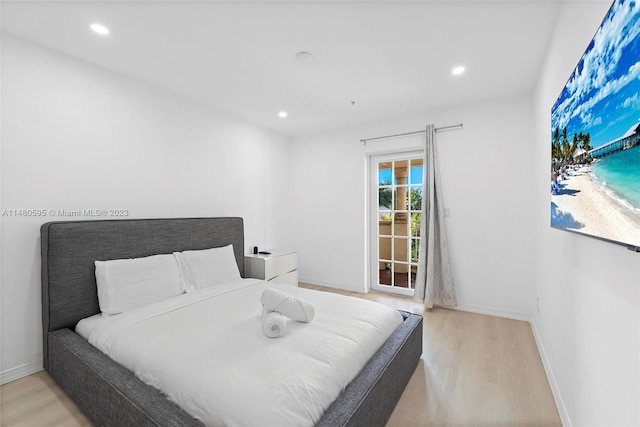 bedroom with light hardwood / wood-style flooring