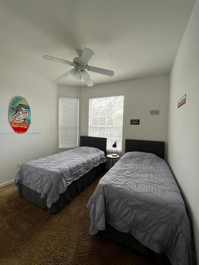 bedroom featuring ceiling fan and carpet flooring