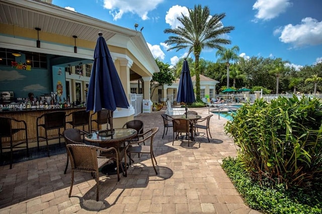 view of patio featuring a bar