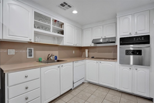 kitchen featuring sink, white cabinetry, black electric cooktop, white dishwasher, and oven