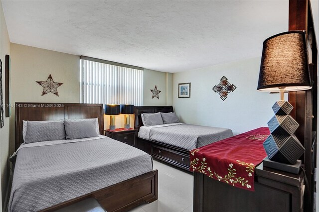 bedroom featuring a textured ceiling