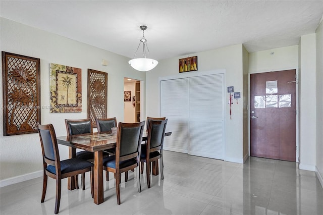 dining room featuring tile patterned floors