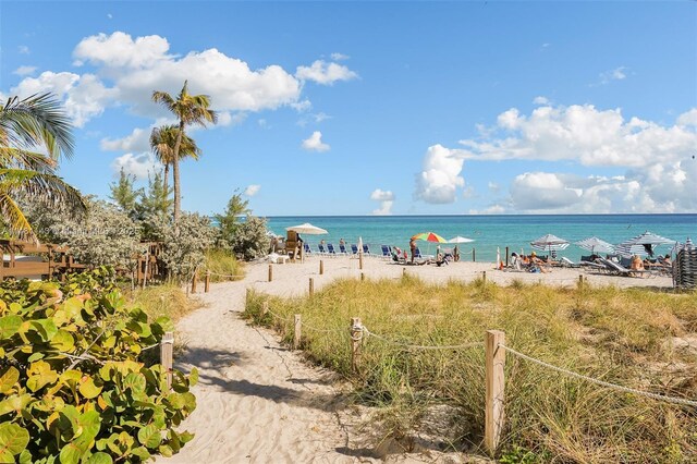 property view of water featuring a beach view