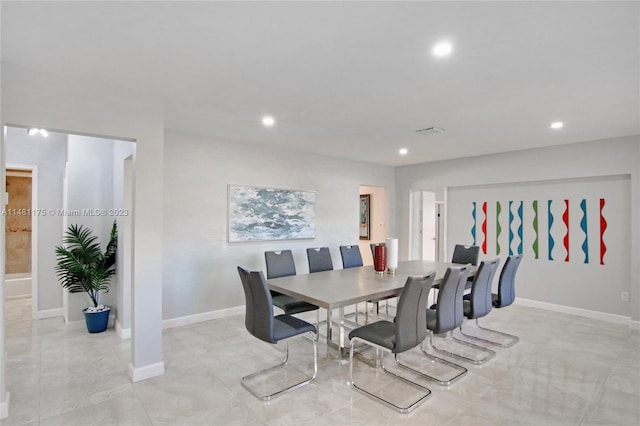 view of tiled dining space