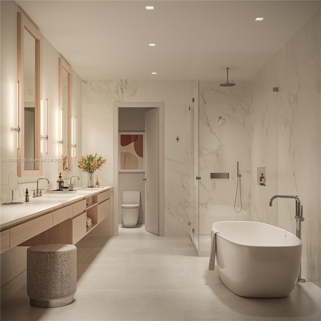 bathroom with tile walls, tile floors, dual vanity, and tiled shower