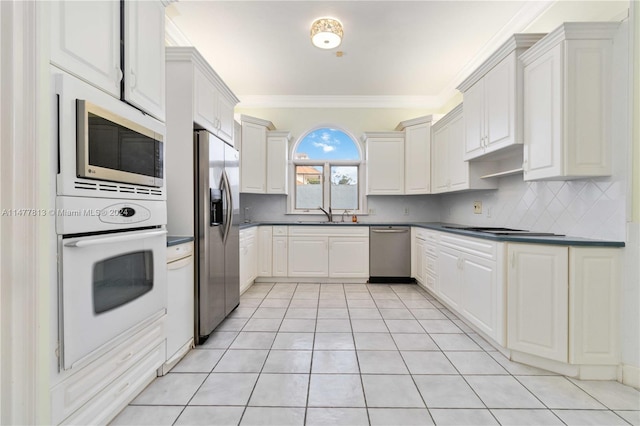 kitchen featuring white cabinets and stainless steel appliances