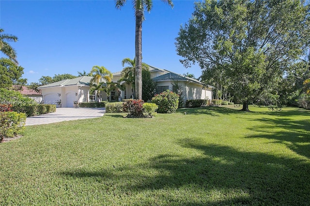 view of yard featuring a garage