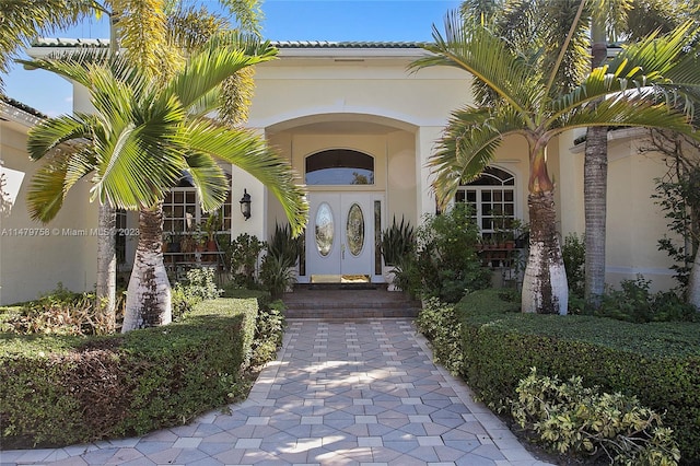 property entrance with french doors