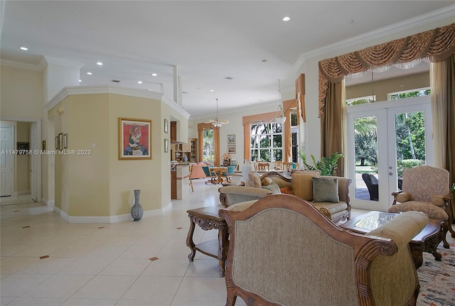 living area with french doors, ornamental molding, a notable chandelier, and light tile floors