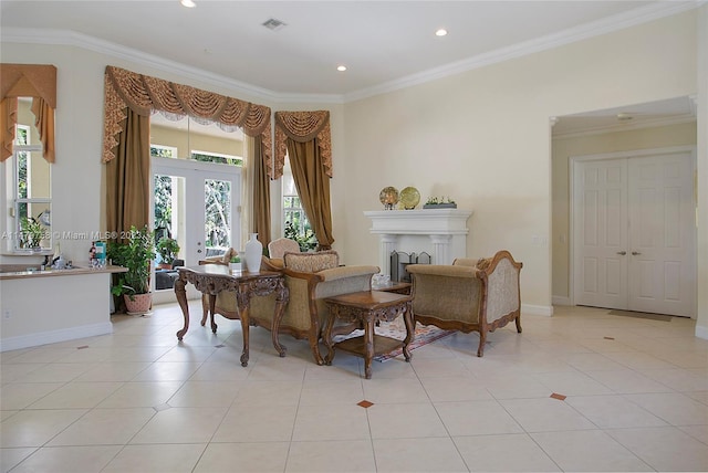 sitting room featuring french doors, light tile flooring, and ornamental molding