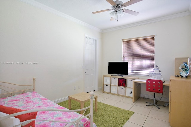 tiled bedroom featuring ornamental molding and ceiling fan