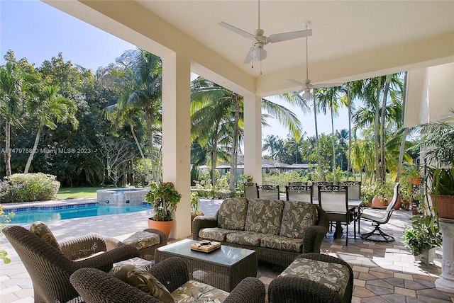 view of patio featuring a pool with hot tub, ceiling fan, and an outdoor hangout area