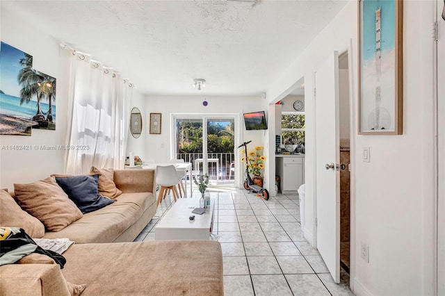 living room featuring light tile floors